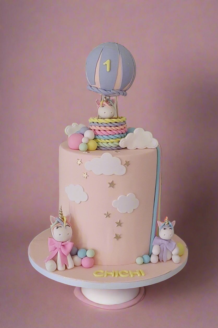 Pink unicorn birthday cake